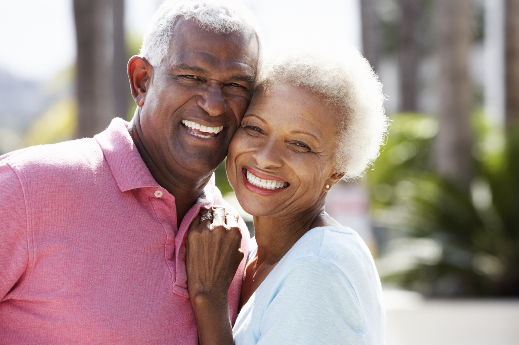 Romantic Senior Couple Hugging In  Street